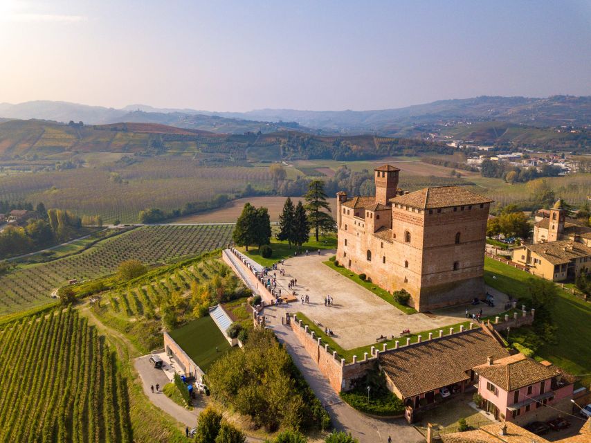 From Milan: Barolo Wine Tasting, Alba Tour and Castle Visit - The enoteca stop: a historical wine-shop break