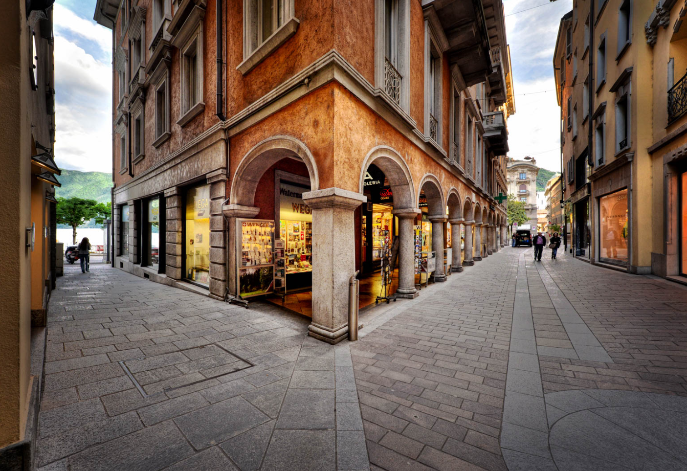 From Milan: Como, Bellagio, and Lugano Exclusive Boat Tour - Crossing into Switzerland: Lugano’s contrast hits fast