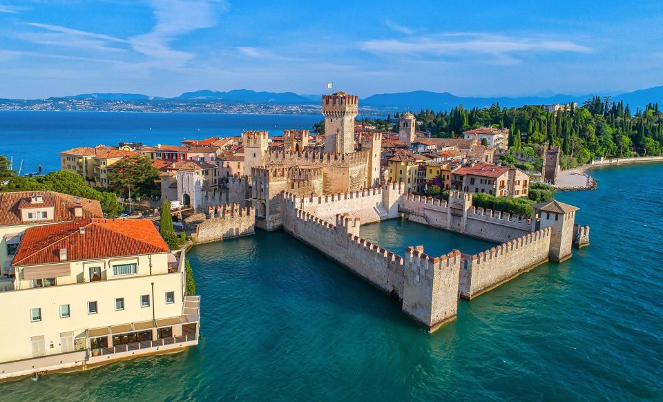 From Milan: Verona, Sirmione and Lake Garda with Boat Cruise - Sirmione on land: old-town streets and Scaliger Castle views