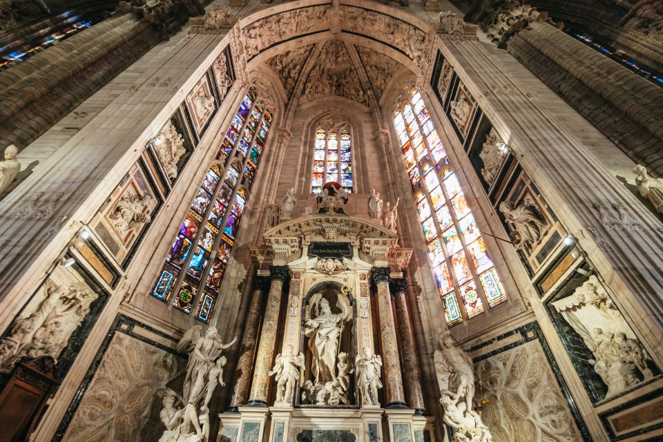Milan: Duomo Rooftop and Cathedral Guided Tour with Tickets - Inside Milan Cathedral: Centuries of Building, Not One Quick Stop