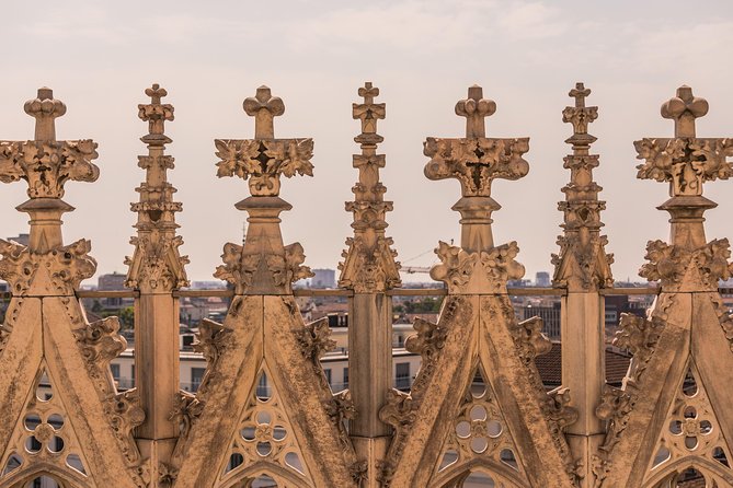Milan Duomo Rooftop Terrace Guided Tour - Piazza del Duomo Stop: The Façade Gets a Fresh Pair of Eyes