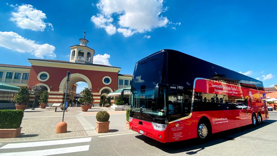 Milan: Serravalle Designer Outlet Roundtrip Bus Transfer - Meet-Up in Milan: Foro Buonaparte vs. the City Sightseeing Stop
